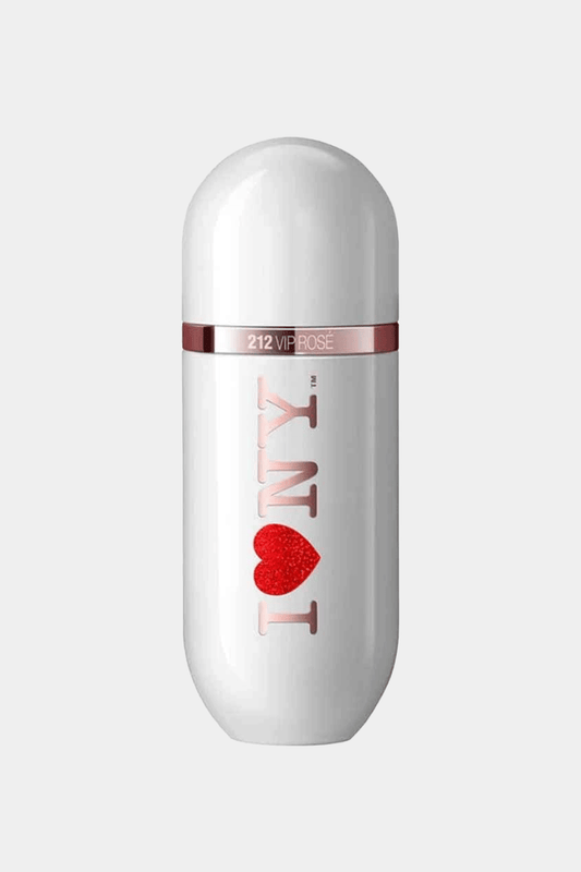 Carolina Herrera's 212 VIP Rosé perfume features a white, rounded bottle with a rose gold band and "I ? NY" design filled with sparkly red glitter. The sleek, sophisticated design combines elegance with playful femininity, set against a simple white background.